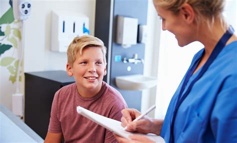 Young Nurse and Boy in Hospital